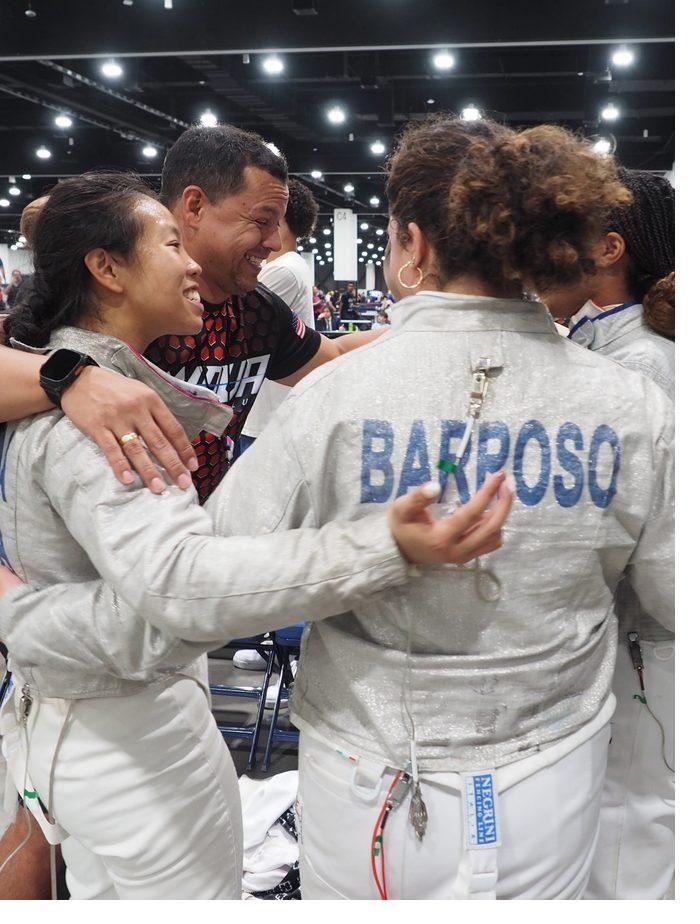 Nova coaches and fencers celebrating